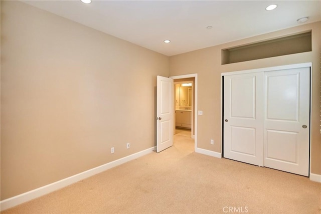 54 Trotter, Irvine, CA 92602 - unfurnished bedroom with light colored carpet, recessed lighting, and a closet