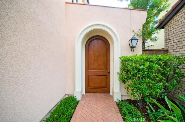 54 Trotter, Irvine, CA 92602 - property entrance featuring stucco siding