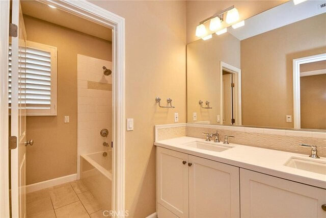54 Trotter, Irvine, CA 92602 - full bath featuring double vanity, tile patterned floors, and washtub / shower combination