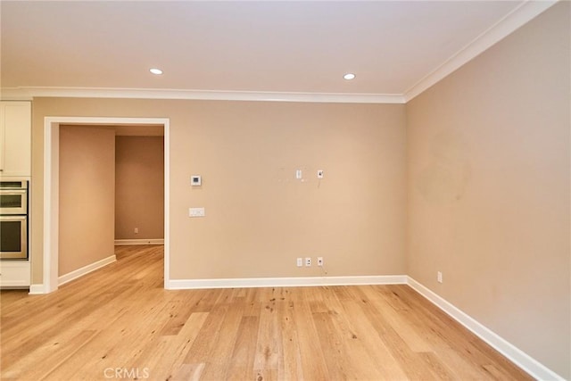 54 Trotter, Irvine, CA 92602 - empty room with ornamental molding, light wood-style floors, and recessed lighting