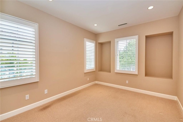 54 Trotter, Irvine, CA 92602 - empty room with light carpet and recessed lighting
