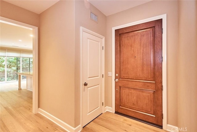 54 Trotter, Irvine, CA 92602 - hallway featuring light wood finished floors and baseboards