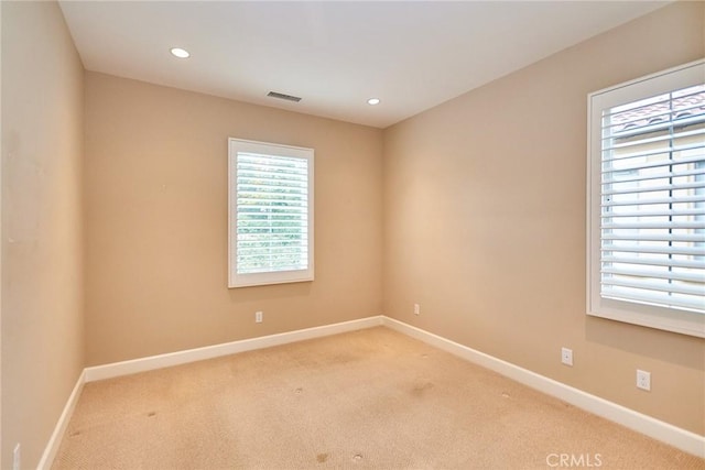 54 Trotter, Irvine, CA 92602 - empty room with light carpet and recessed lighting