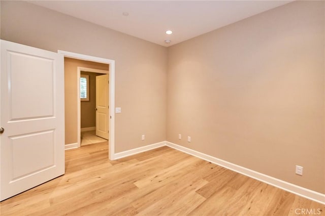 54 Trotter, Irvine, CA 92602 - unfurnished room with light wood-style floors and recessed lighting