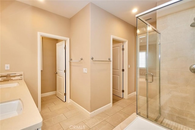 54 Trotter, Irvine, CA 92602 - full bath with a stall shower, double vanity, tile patterned flooring, and recessed lighting