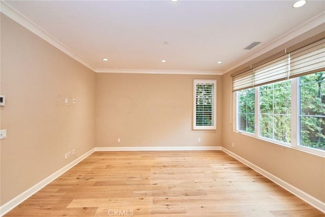 54 Trotter, Irvine, CA 92602 - spare room featuring ornamental molding, light wood-type flooring, and recessed lighting
