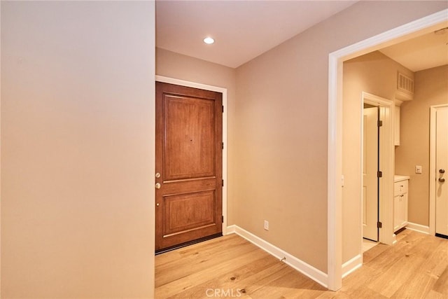 54 Trotter, Irvine, CA 92602 - hall with light wood-style flooring and recessed lighting
