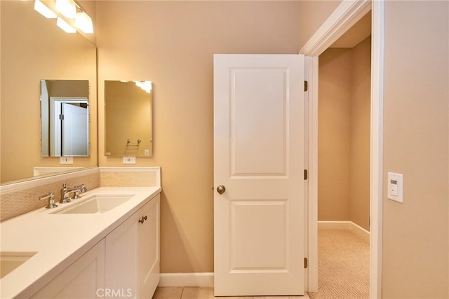 54 Trotter, Irvine, CA 92602 - bathroom featuring double vanity and baseboards
