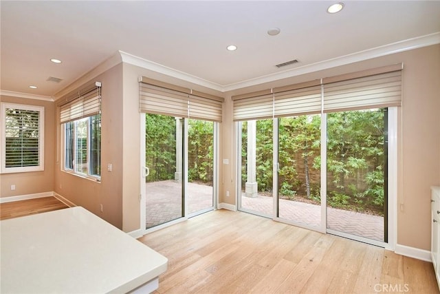 54 Trotter, Irvine, CA 92602 - interior space featuring crown molding, light wood finished floors, and recessed lighting