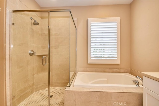 54 Trotter, Irvine, CA 92602 - bathroom featuring a garden tub, a stall shower, and vanity