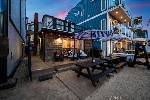 27 A Surfside Ave, Surfside, CA 90743 - rear view of house featuring a wooden deck
