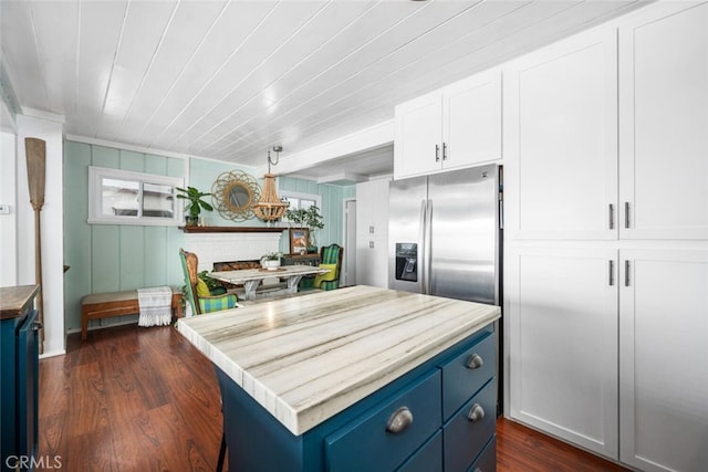 27 A Surfside Ave, Surfside, CA 90743 - kitchen with blue cabinetry, stainless steel fridge, dark wood finished floors, white cabinetry, and wooden ceiling