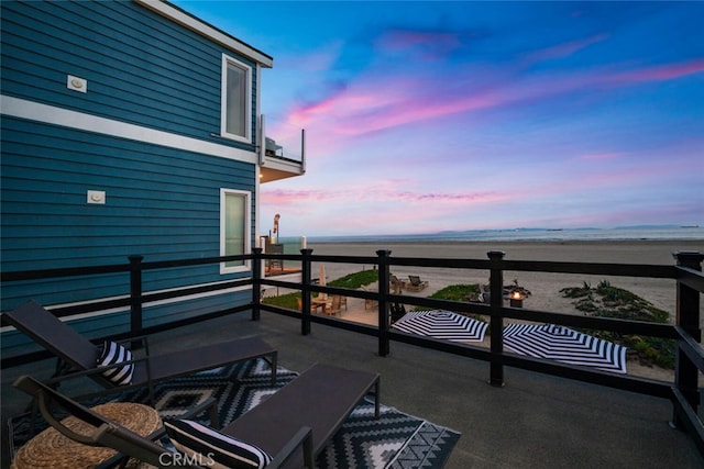 27 A Surfside Ave, Surfside, CA 90743 - balcony at dusk featuring a water view