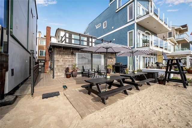 27 A Surfside Ave, Surfside, CA 90743 - rear view of house featuring a deck