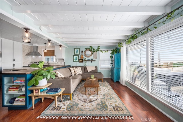 27 A Surfside Ave, Surfside, CA 90743 - living area with dark wood finished floors and a wood ceiling with exposed beams