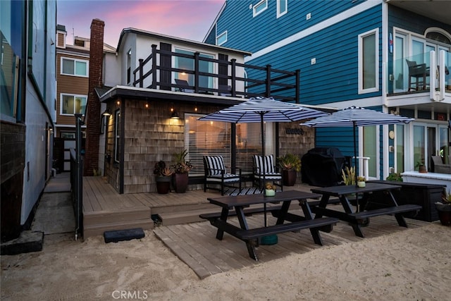 27 A Surfside Ave, Surfside, CA 90743 - rear view of house with a balcony and a deck
