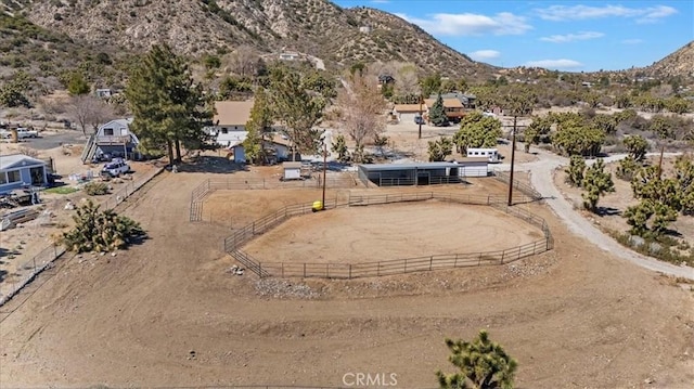 drone / aerial view with a rural view and a mountain view