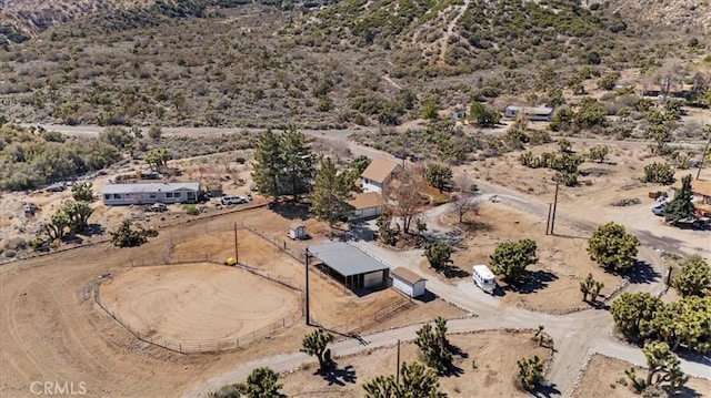 drone / aerial view featuring a desert view