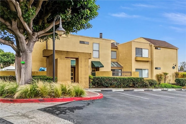 25712 Le Parc Unit 96, Lake Forest, CA 92630 - view of property with uncovered parking