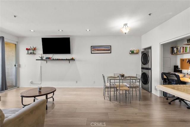 19350 Sherman Way Unit 204, Reseda, CA 91335 - dining space with stacked washer / dryer, wood finished floors, a desk, and recessed lighting