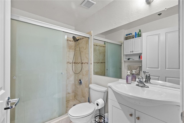 19350 Sherman Way Unit 204, Reseda, CA 91335 - full bathroom featuring vanity, toilet, and a stall shower