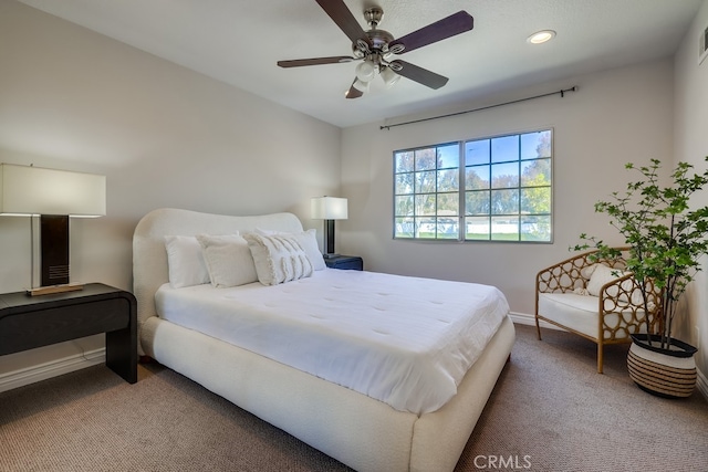 bedroom with carpet, recessed lighting, baseboards, a ceiling fan, and visible vents
