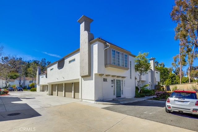 exterior space with an attached garage and driveway