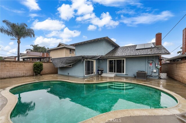 21322 Millpoint Ave, Carson, CA 90745 - view of swimming pool featuring a patio, a fenced in pool, a fenced backyard, and central air condition unit