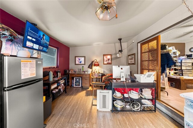 21322 Millpoint Ave, Carson, CA 90745 - interior space with ceiling fan, wood finished floors, and freestanding refrigerator