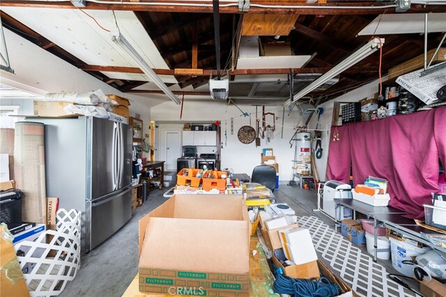 21322 Millpoint Ave, Carson, CA 90745 - basement with strapped water heater and freestanding refrigerator