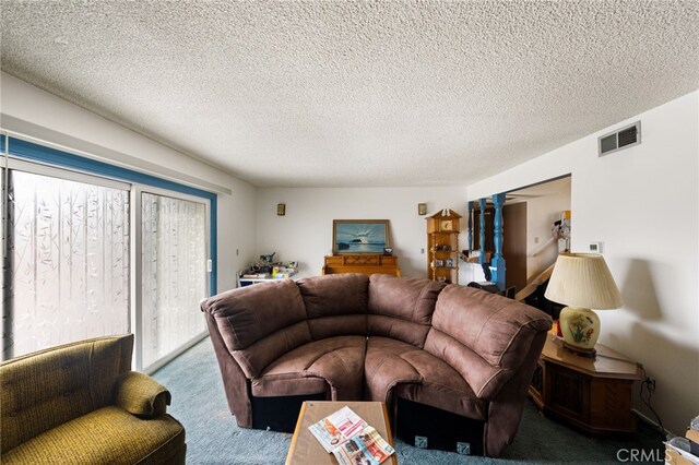 21322 Millpoint Ave, Carson, CA 90745 - living room with carpet floors, a textured ceiling, and visible vents
