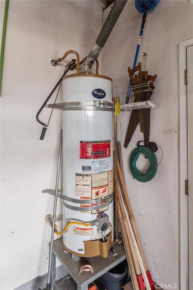 21322 Millpoint Ave, Carson, CA 90745 - utility room featuring secured water heater