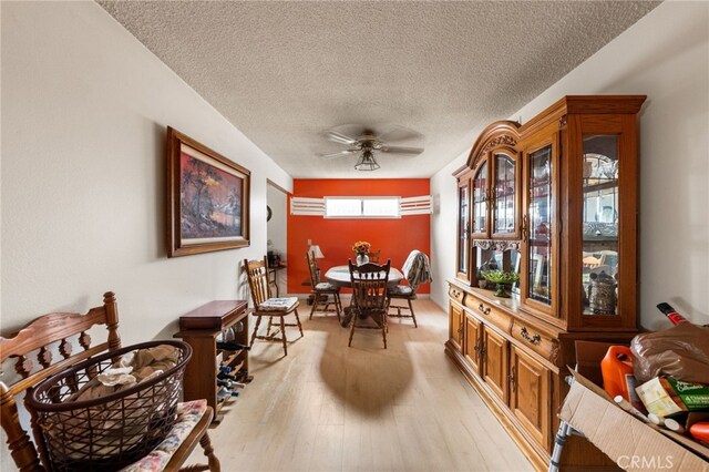 21322 Millpoint Ave, Carson, CA 90745 - dining area with a textured ceiling, ceiling fan, and light wood-type flooring
