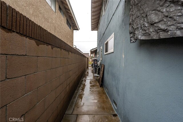 21322 Millpoint Ave, Carson, CA 90745 - view of property exterior with stucco siding and fence