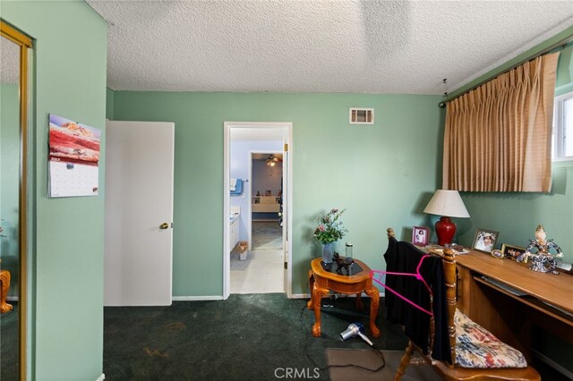 21322 Millpoint Ave, Carson, CA 90745 - home office featuring a textured ceiling, visible vents, and carpet