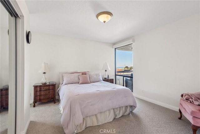 2545 Via Campesina Unit 303, Palos Verdes Estates, CA 90274 - carpeted bedroom with baseboards and access to outside