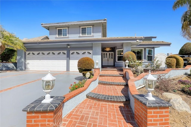 15331 Lillian Pl, Hacienda Heights, CA 91745 - traditional home featuring driveway, a garage, and french doors