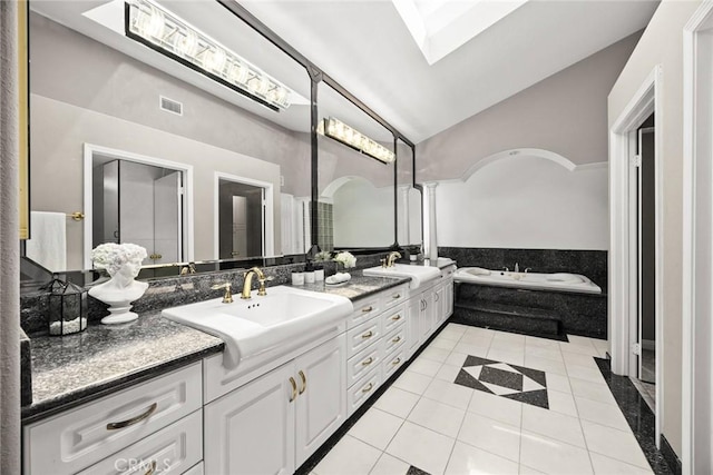15331 Lillian Pl, Hacienda Heights, CA 91745 - full bathroom featuring visible vents, a sink, tile patterned floors, and vaulted ceiling with skylight