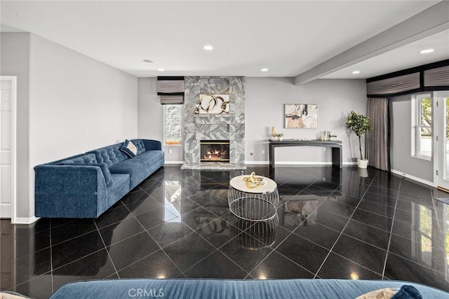 15331 Lillian Pl, Hacienda Heights, CA 91745 - living room with a high end fireplace, baseboards, recessed lighting, beam ceiling, and granite finish floor