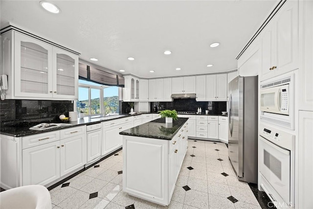 15331 Lillian Pl, Hacienda Heights, CA 91745 - kitchen featuring recessed lighting, under cabinet range hood, and white appliances