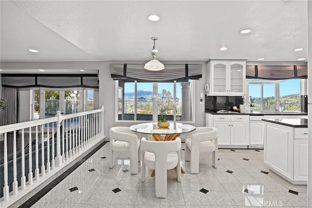 15331 Lillian Pl, Hacienda Heights, CA 91745 - dining room with a textured ceiling, granite finish floor, and recessed lighting