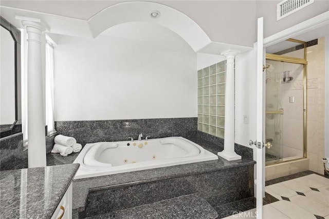 15331 Lillian Pl, Hacienda Heights, CA 91745 - bathroom featuring decorative columns, a tub with jets, visible vents, and a shower stall