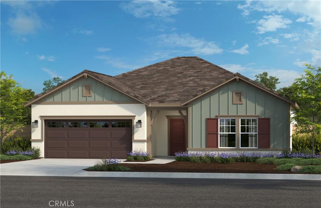 view of front of house featuring driveway, an attached garage, and board and batten siding