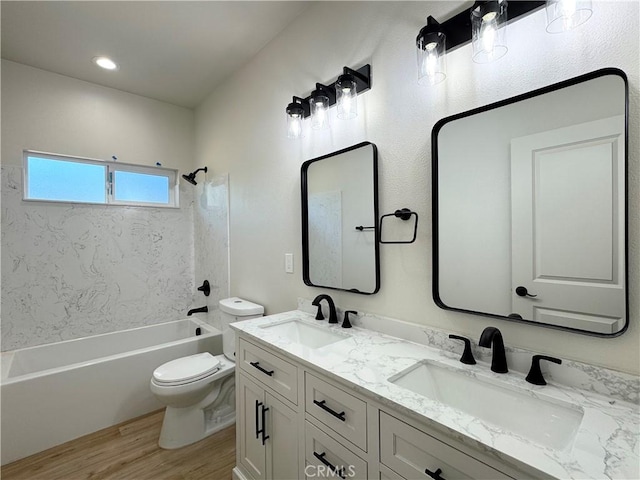 6296 Chatham Ct, Magalia, CA 95954 - bathroom with a sink, toilet, wood finished floors, and shower / washtub combination
