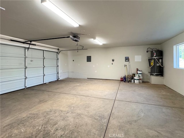6296 Chatham Ct, Magalia, CA 95954 - garage with strapped water heater, a garage door opener, and electric panel