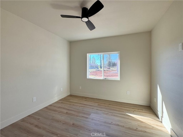 6296 Chatham Ct, Magalia, CA 95954 - spare room with baseboards, ceiling fan, and wood finished floors