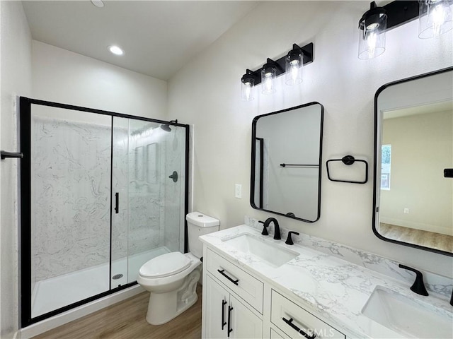 6296 Chatham Ct, Magalia, CA 95954 - bathroom with a sink, a shower stall, toilet, and wood finished floors