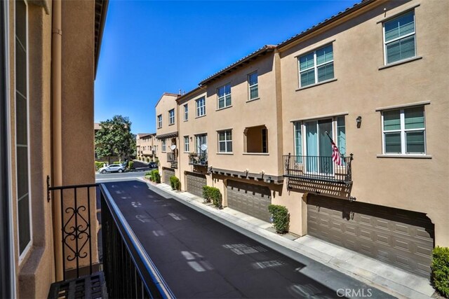 balcony featuring a residential view