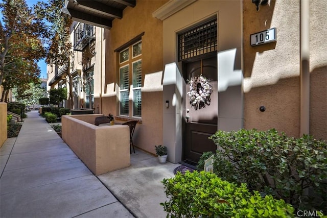 exterior space featuring stucco siding