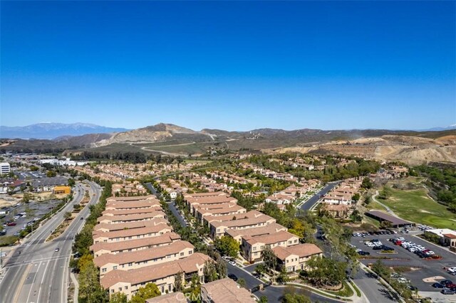 drone / aerial view featuring a mountain view